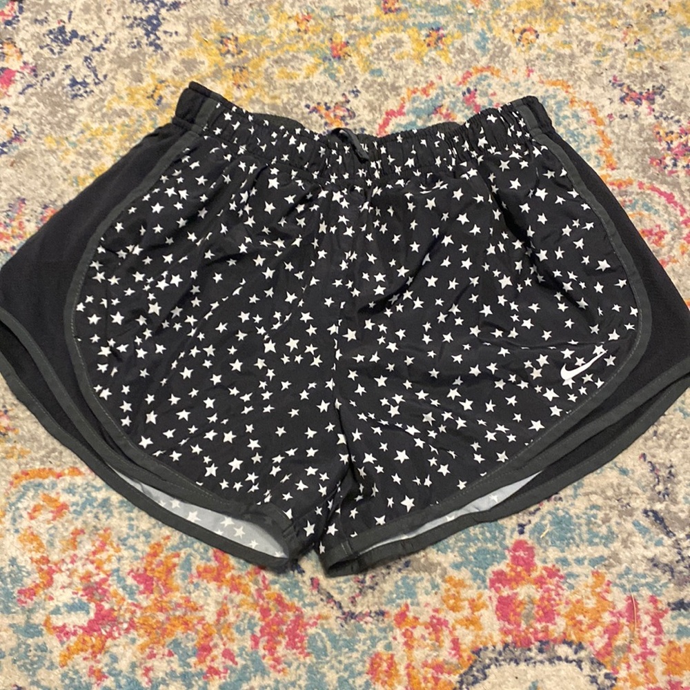 Black star pattern Nike shorts, size medium